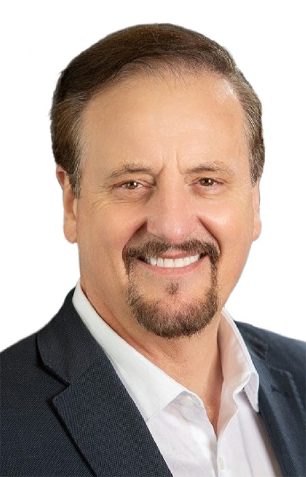 TRREB CEO, John DiMichele smiling.