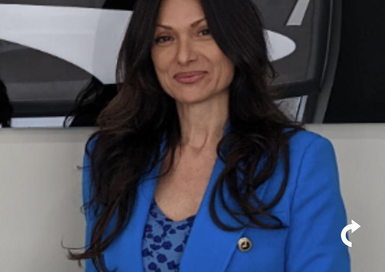 Rose Sorbera smiling with blue jacket on.