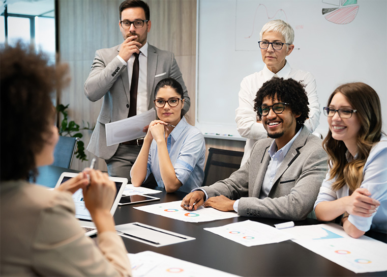 group of business people working together, brainstorming in office.